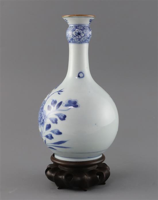 A Chinese blue and white guglet vase, 18th century, H. 23.5cm, wood stand